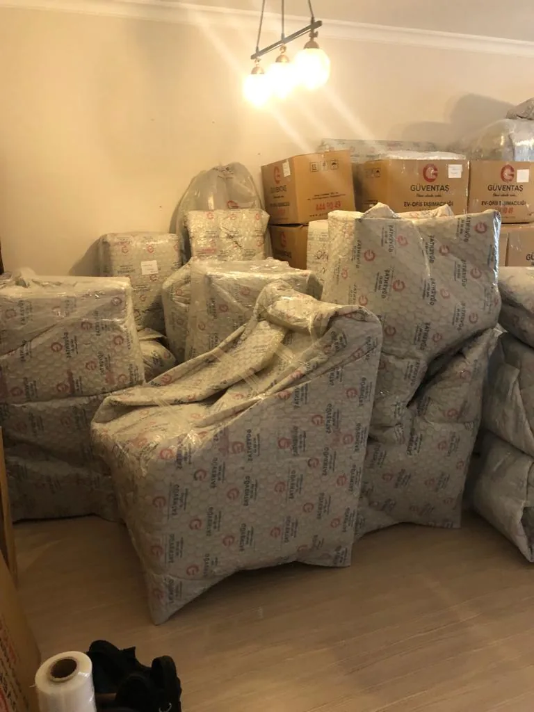 Protectively packed household goods prepared for transport