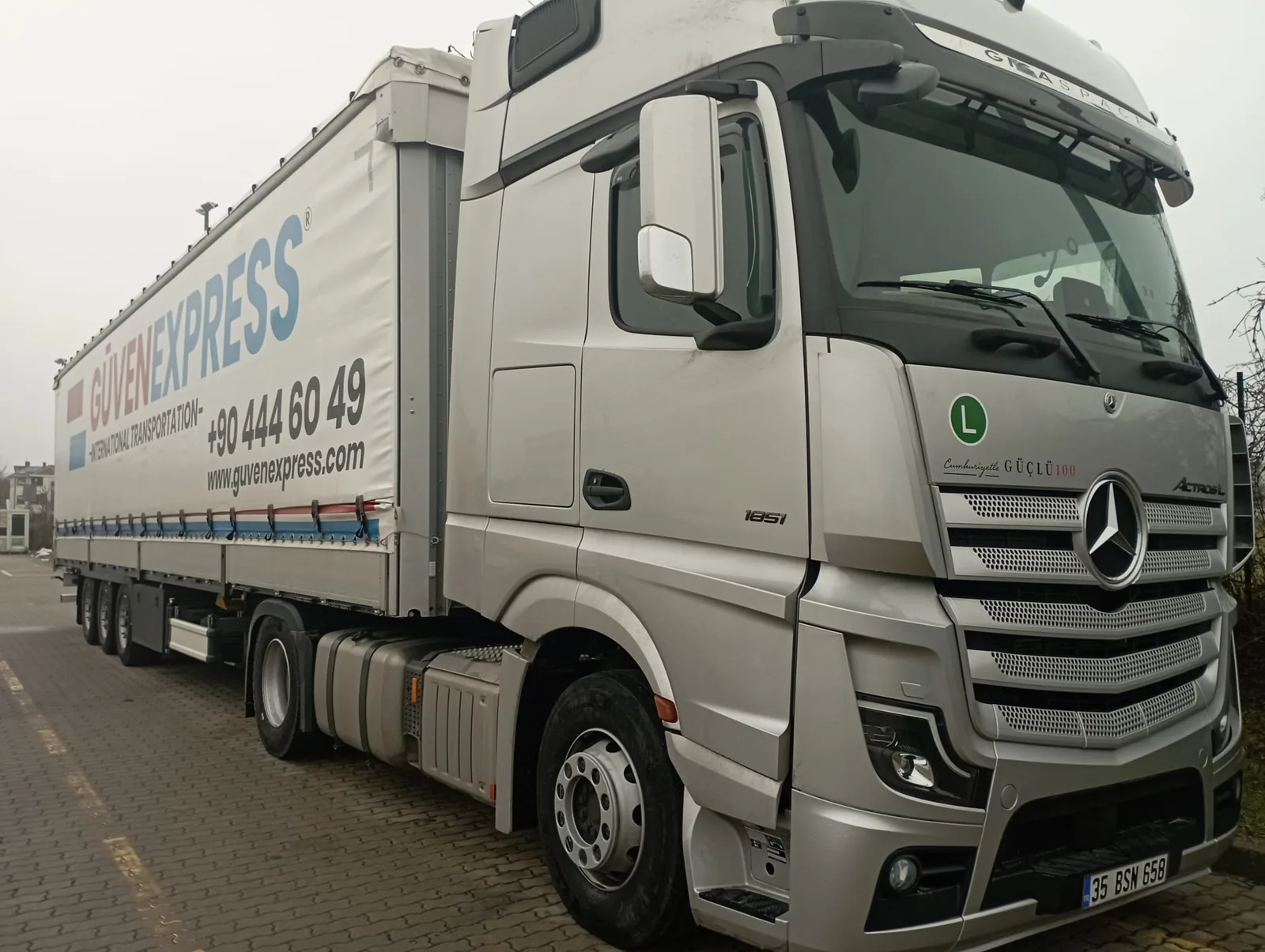 GüvenExpress branded truck prepared for international road transport