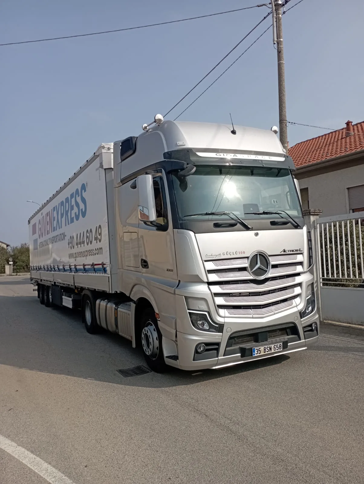 GüvenExpress road freight truck on an active route