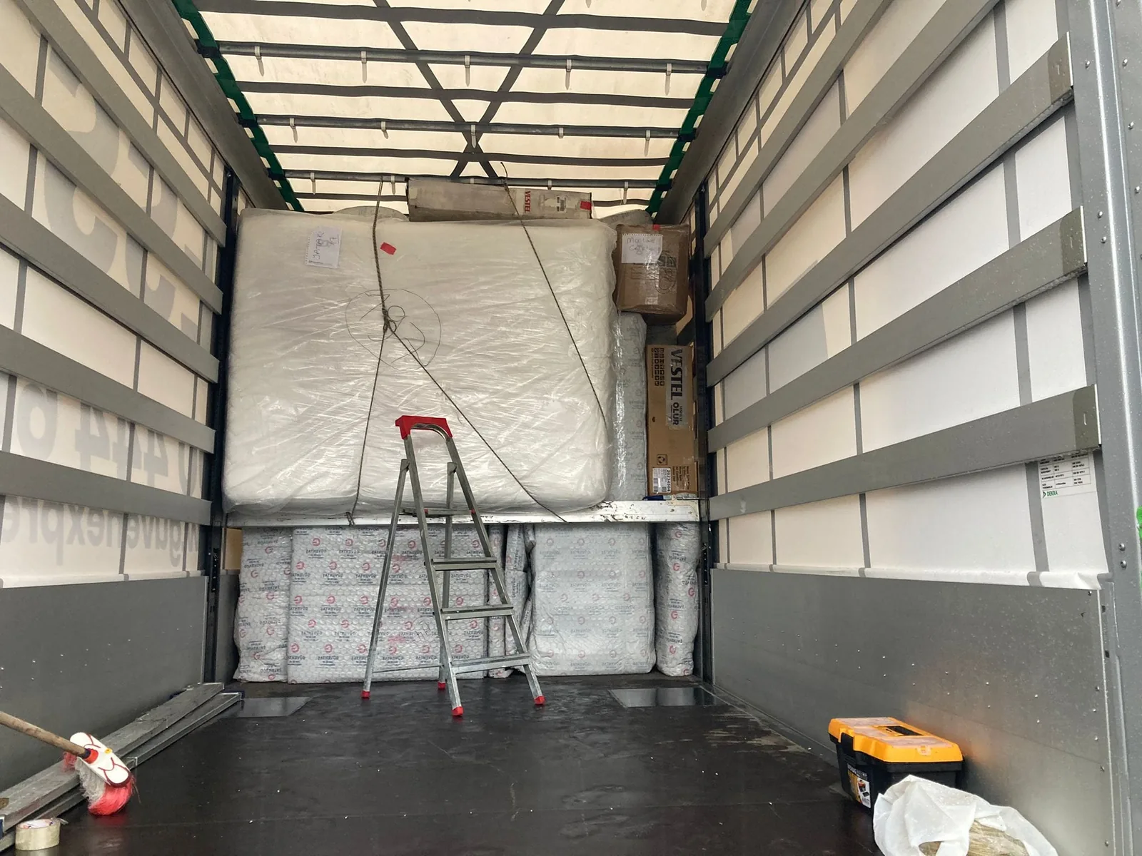 Commercial cargo secured inside a GüvenExpress trailer